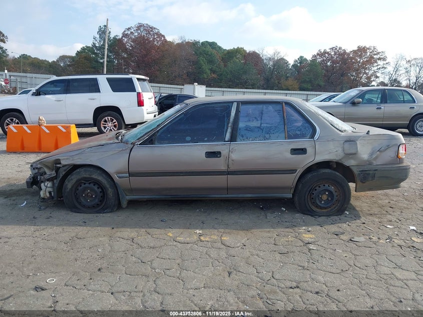 1992 Honda Accord Dx VIN: 1HGCB7643NA202599 Lot: 43732806