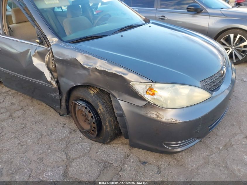 2003 Toyota Camry Le VIN: 4T1BE32K13U785647 Lot: 43733692