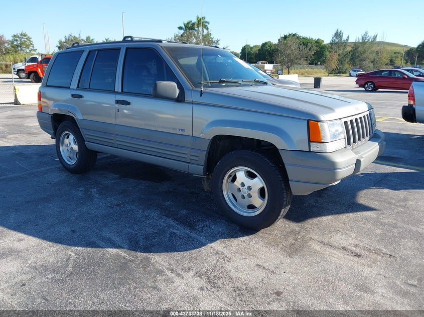1J4GZ58Y3VC742128 1997 Jeep Grand Cherokee Laredo/Tsi auction photo 1
