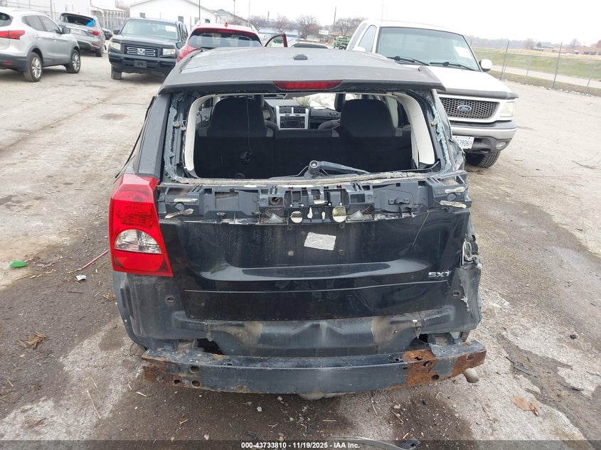 2009 Dodge Caliber Sxt VIN: 1B3HB48A29D125820 Lot: 43733810