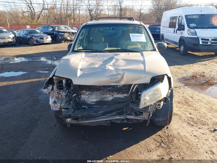 2007 Mercury Mariner Luxury VIN: 4M2YU91197KJ06345 Lot: 43736397