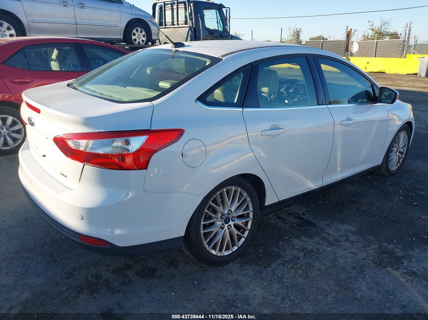 1FAHP3H23CL348860 2012 FORD FOCUS photo no. 4