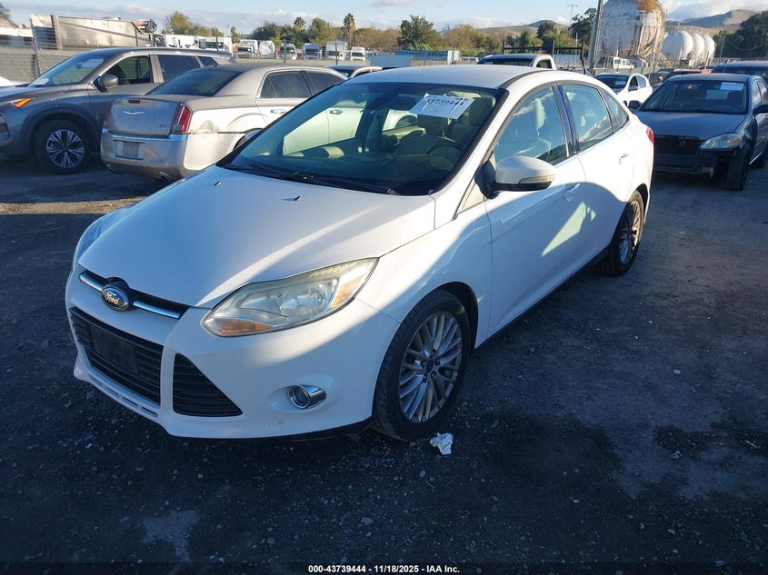 1FAHP3H23CL348860 2012 FORD FOCUS photo no. 6