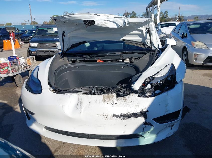 2022 Tesla Model 3 Long Range Dual Motor All-Wheel Drive VIN: 5YJ3E1EB6NF125799 Lot: 43739685