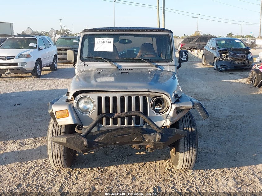2000 Jeep Wrangler Sport VIN: 1J4FA49S4YP767138 Lot: 43741740