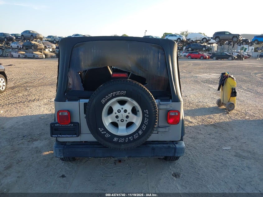 2000 Jeep Wrangler Sport VIN: 1J4FA49S4YP767138 Lot: 43741740