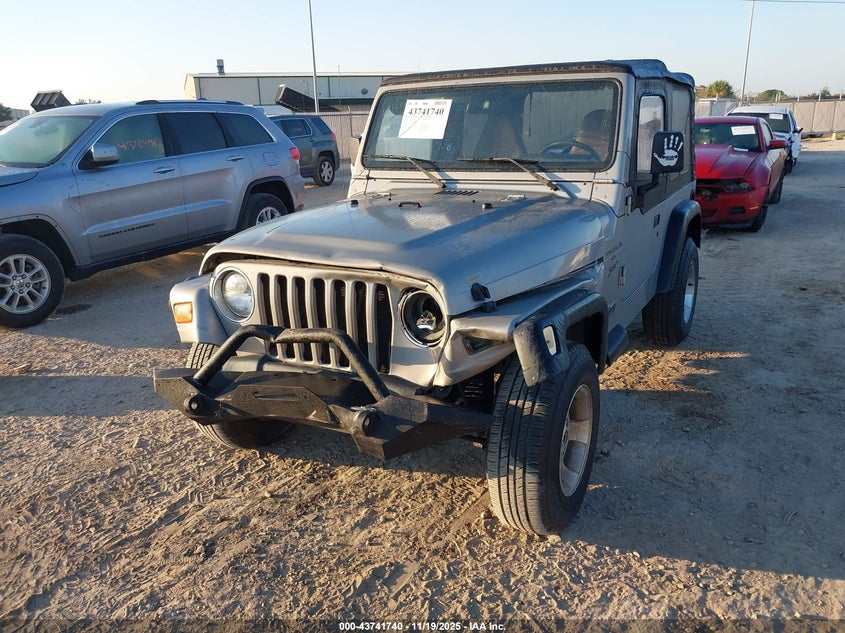 2000 Jeep Wrangler Sport VIN: 1J4FA49S4YP767138 Lot: 43741740