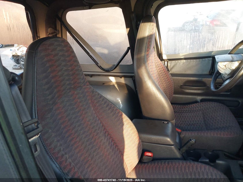 2000 Jeep Wrangler Sport VIN: 1J4FA49S4YP767138 Lot: 43741740