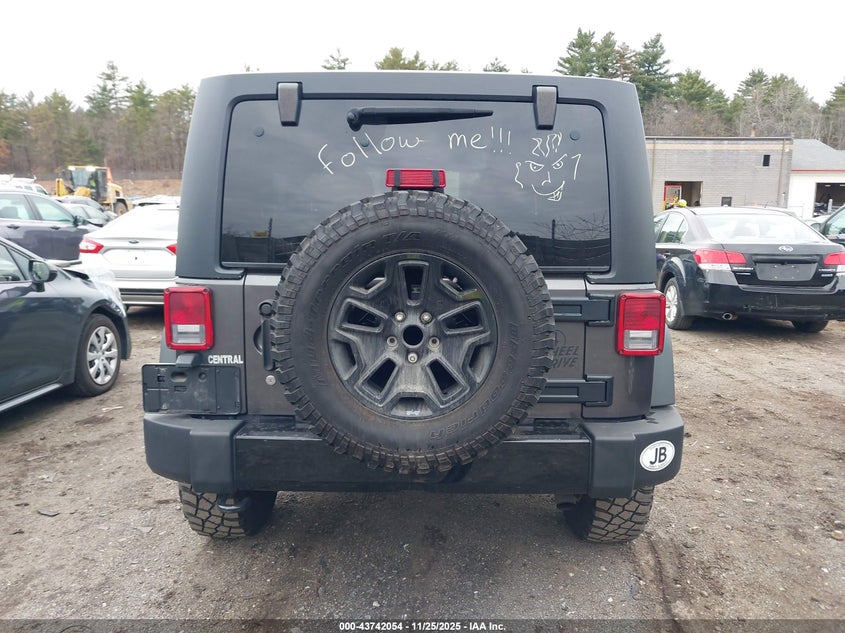 2014 Jeep Wrangler Unlimited Willys Wheeler VIN: 1C4BJWDG2EL299027 Lot: 43742054