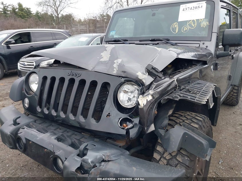 2014 Jeep Wrangler Unlimited Willys Wheeler VIN: 1C4BJWDG2EL299027 Lot: 43742054