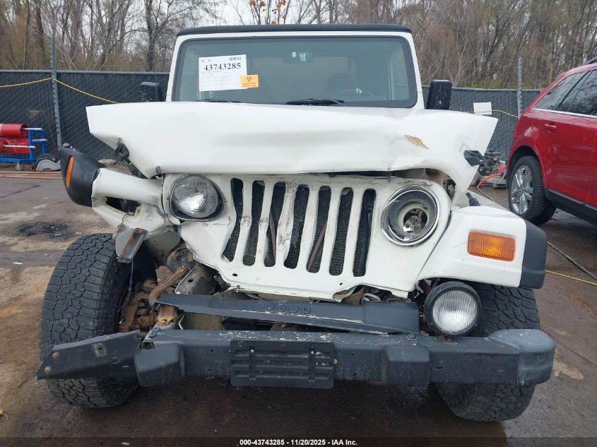 1999 Jeep Wrangler Sport VIN: 1J4FY19S8XP409324 Lot: 43743285