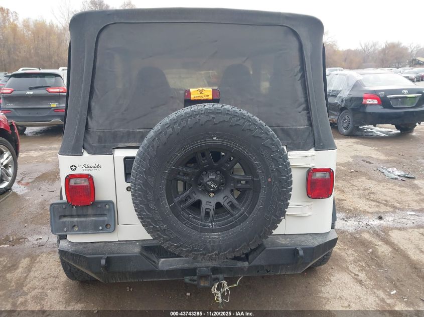 1999 Jeep Wrangler Sport VIN: 1J4FY19S8XP409324 Lot: 43743285