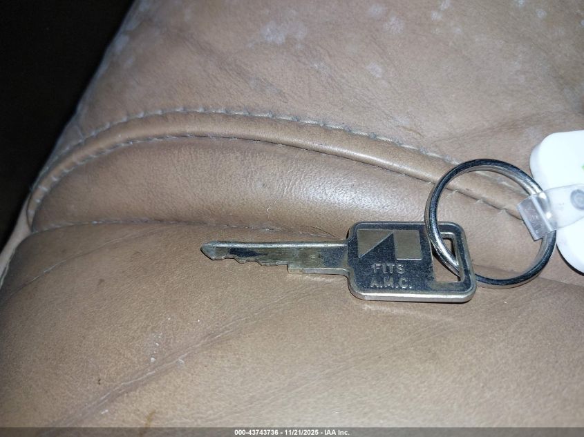 1985 Jeep Wagoneer Limited VIN: 1JCWC7567FT079177 Lot: 43743736