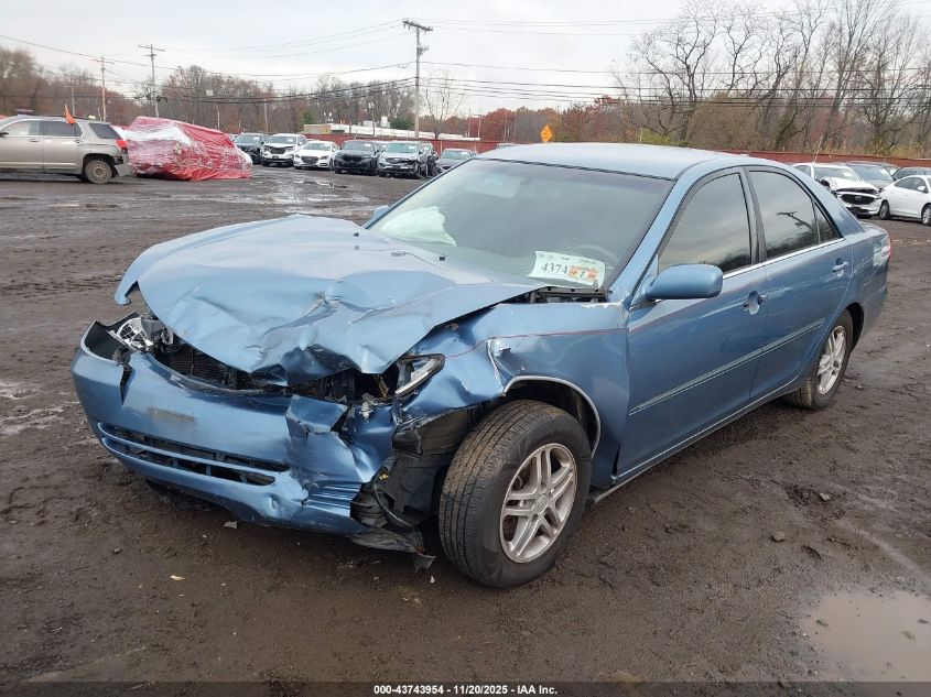 2002 Toyota Camry Xle VIN: 4T1BE30K12U596594 Lot: 43743954