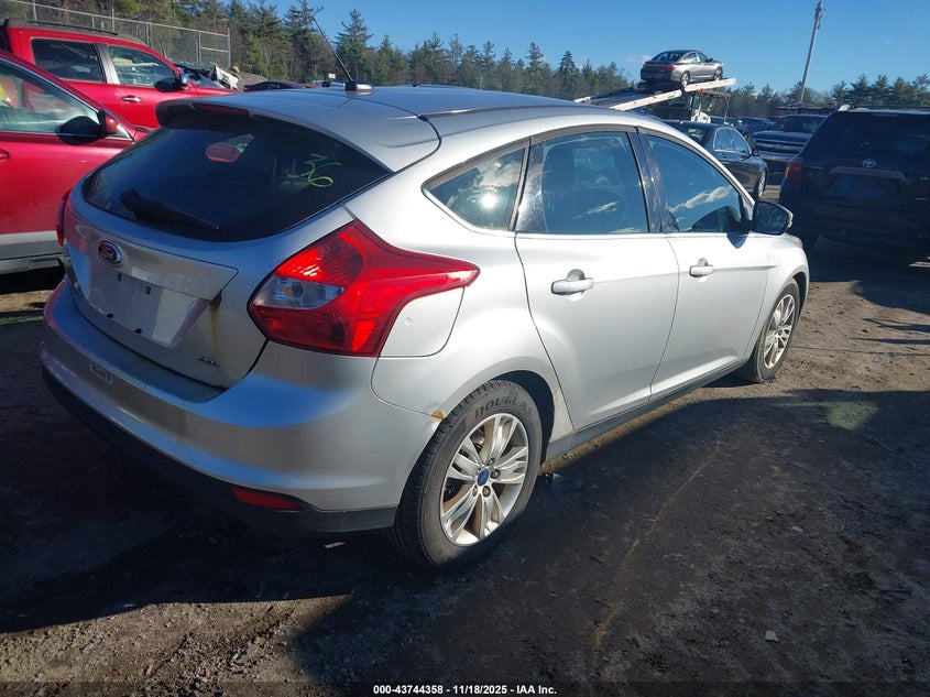 1FAHP3M22CL229185 2012 FORD FOCUS photo no. 4
