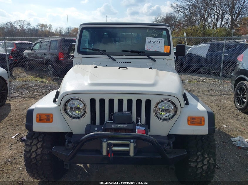 2000 Jeep Wrangler Sport VIN: 1J4FA49S6YP721844 Lot: 43745551