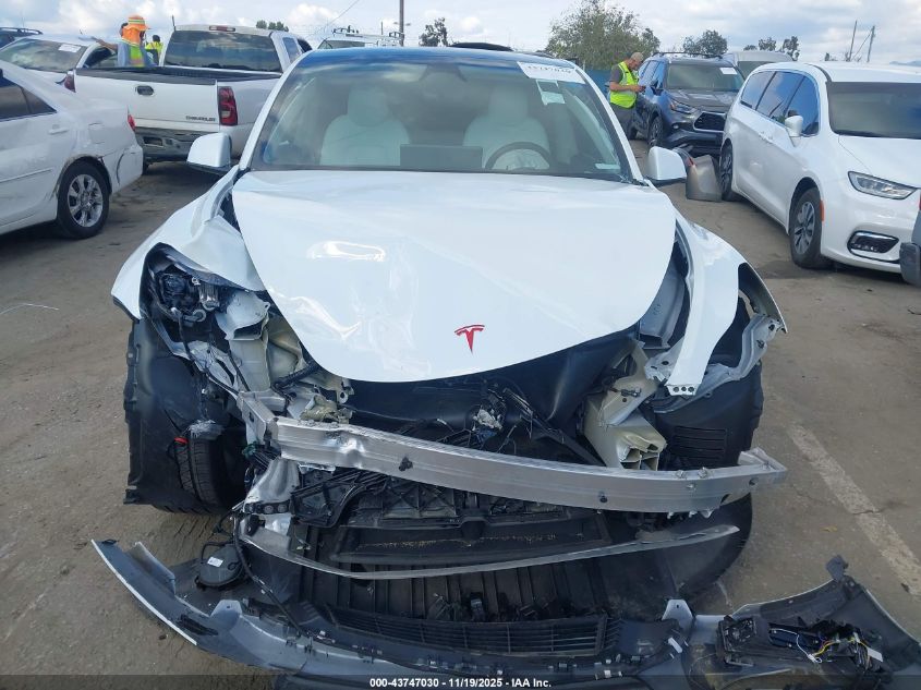 2024 Tesla Model Y Long Range Dual Motor All-Wheel Drive VIN: 7SAYGDEE2RF063709 Lot: 43747030