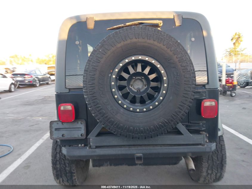 2001 Jeep Wrangler Sport VIN: 1J4FA49S51P333140 Lot: 43749411