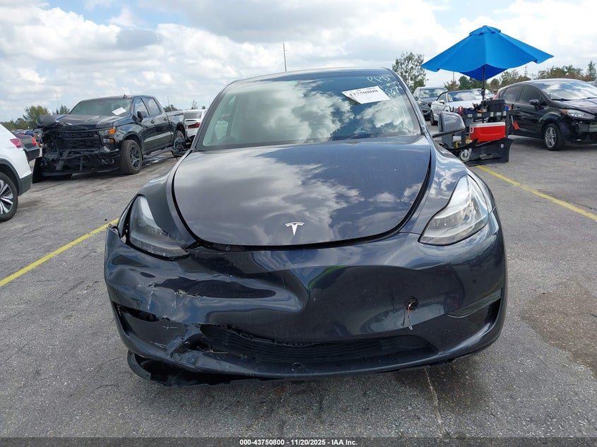 2024 Tesla Model Y Long Range Dual Motor All-Wheel Drive/Rwd VIN: 7SAYGDED2RF095874 Lot: 43750800