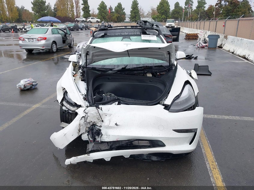 2023 Tesla Model 3 Long Range Dual Motor All-Wheel Drive VIN: 5YJ3E1EB1PF633780 Lot: 43751602