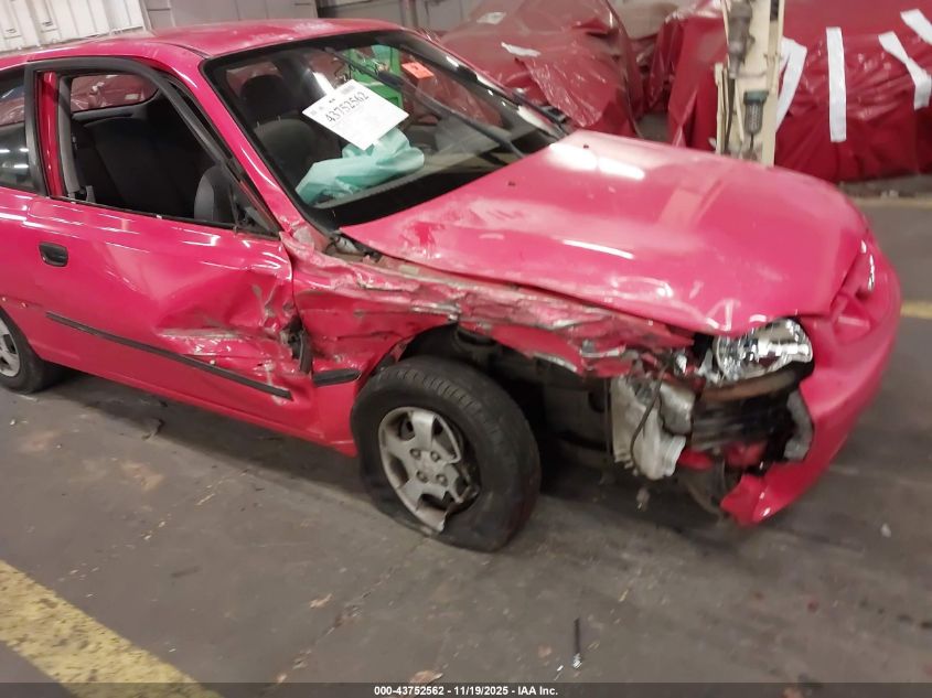 2000 Hyundai Accent L VIN: KMHCF35G8YU016093 Lot: 43752562