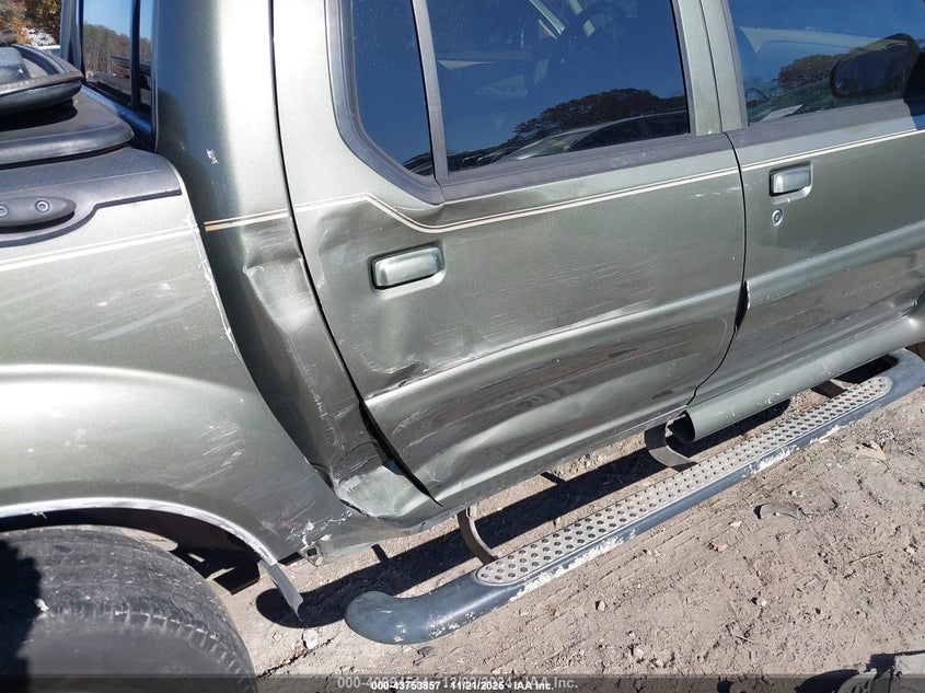 2004 Ford Explorer Sport Trac Adrenalin/Xls/Xlt VIN: 1FMZU67K74UB10303 Lot: 43753857