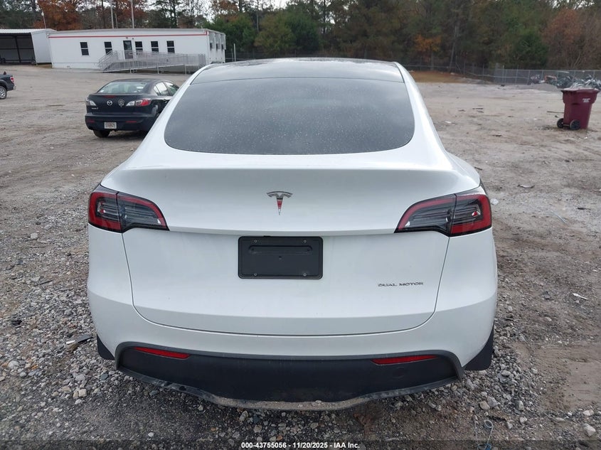 2023 Tesla Model Y Awd/Long Range Dual Motor All-Wheel Drive VIN: 7SAYGDEE9PA063295 Lot: 43755056