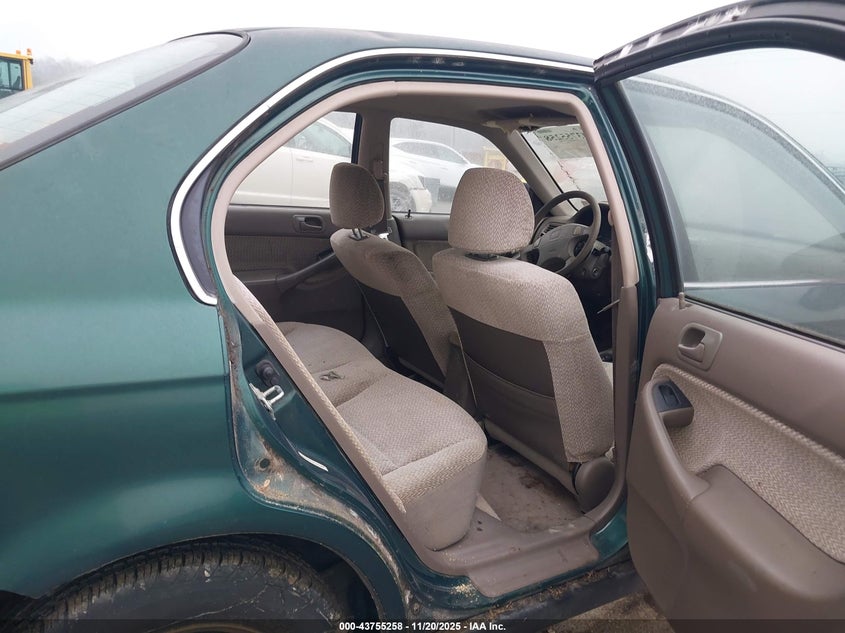 1999 Honda Civic Lx VIN: 1HGEJ6670XL042396 Lot: 43755258