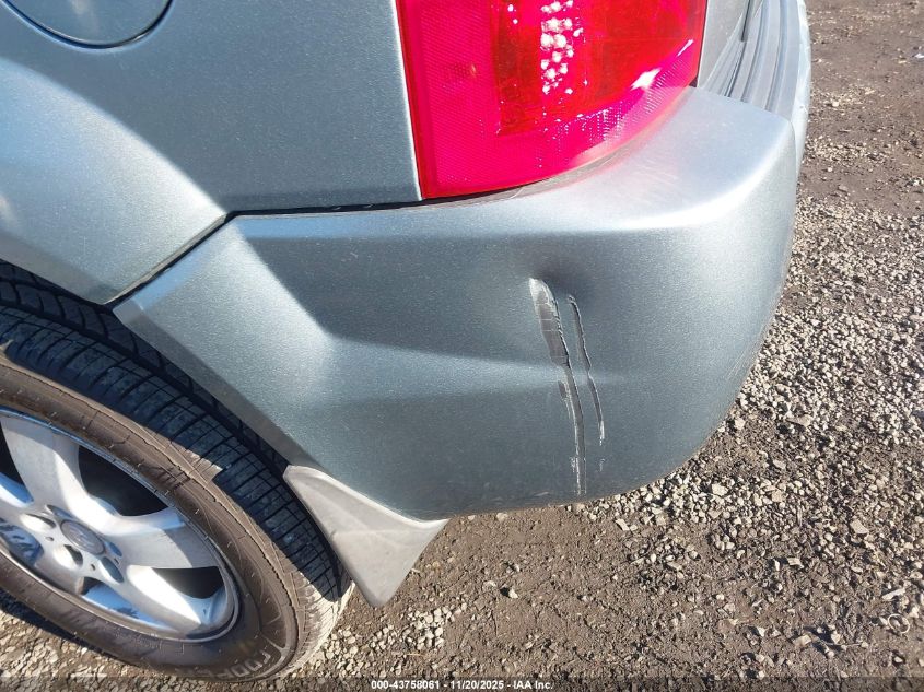 2005 Hyundai Tucson Gl VIN: KM8JM12BX5U221842 Lot: 43758061