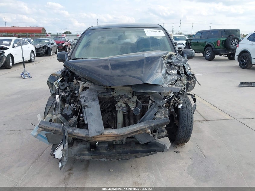 2009 Nissan Versa 1.8S VIN: 3N1BC11E79L395975 Lot: 43758226