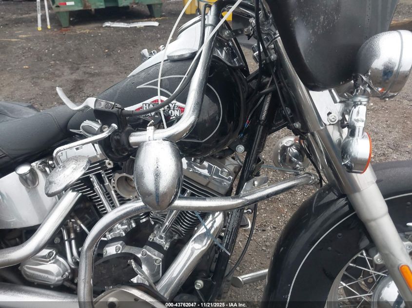 2011 Harley-Davidson Flstc VIN: 1HD1BW515BB019703 Lot: 43762047