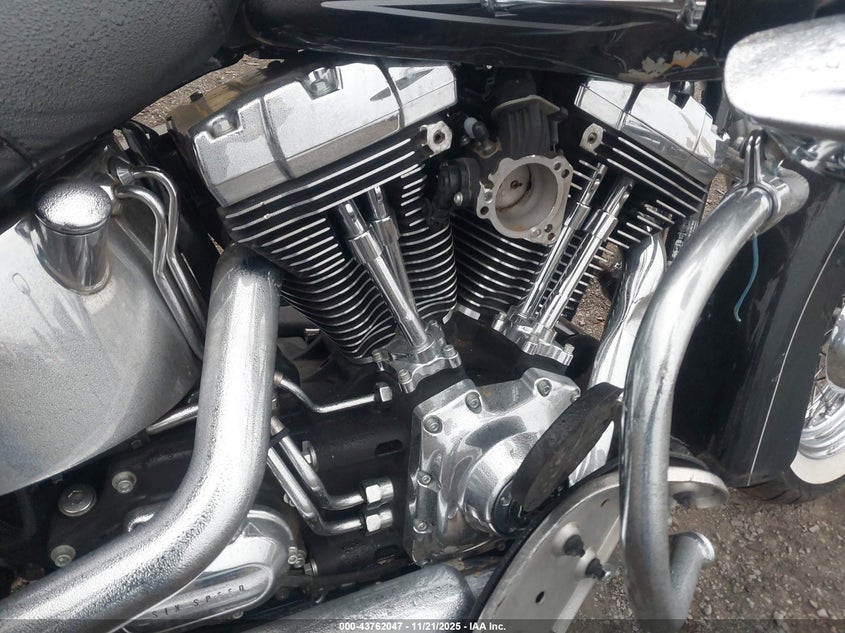 2011 Harley-Davidson Flstc VIN: 1HD1BW515BB019703 Lot: 43762047