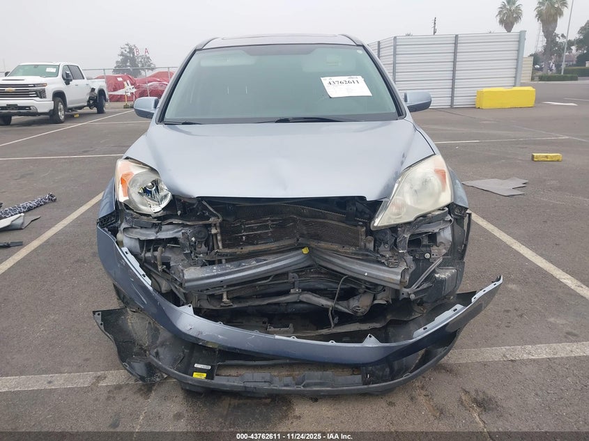 2007 Honda Cr-V Ex-L VIN: JHLRE38727C054715 Lot: 43762611