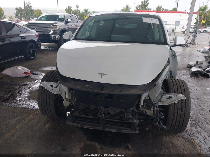 2023 Tesla Model Y Awd/Long Range Dual Motor All-Wheel Drive VIN: 7SAYGDEE4PA129168 Lot: 43763730