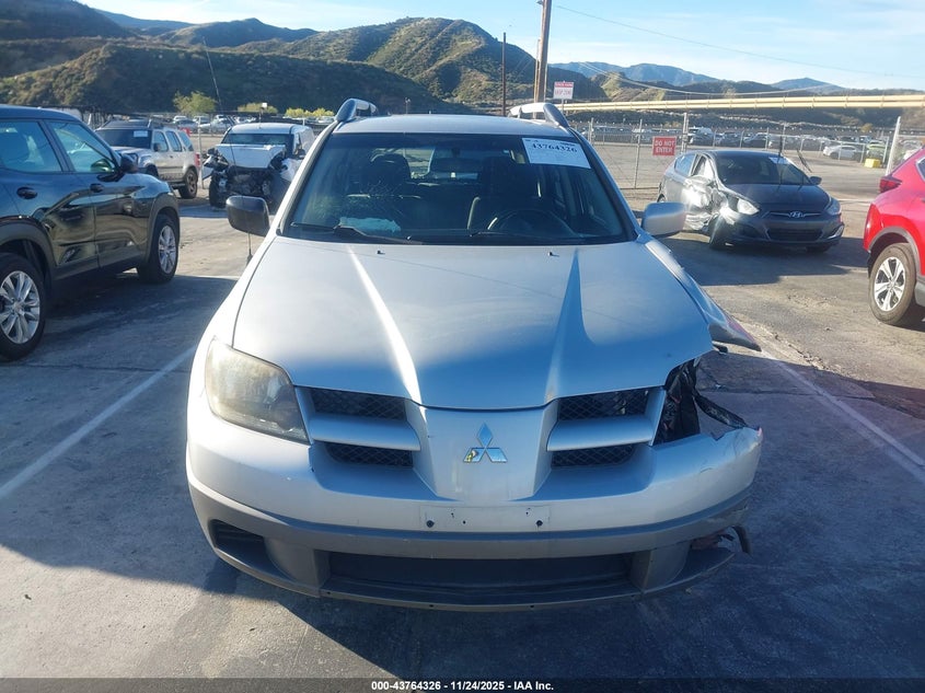 2003 Mitsubishi Outlander Ls VIN: JA4LX31GX3U046979 Lot: 43764326