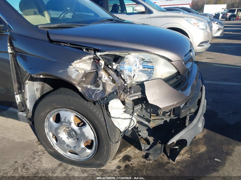 2009 Honda Cr-V Lx VIN: 3CZRE38319G706244 Lot: 43765539