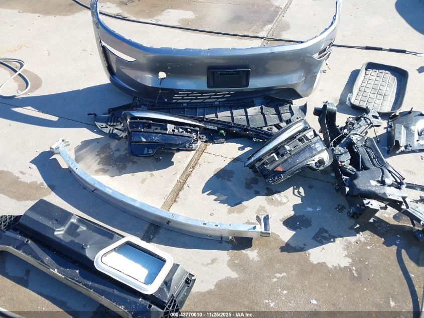 2026 Tesla Model Y Long Range Dual Motor All-Wheel Drive/Long Range Launch Series VIN: 7SAYGDEE8TA401988 Lot: 43770010