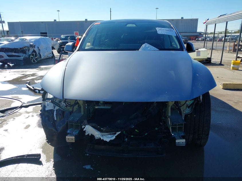 2026 Tesla Model Y Long Range Dual Motor All-Wheel Drive/Long Range Launch Series VIN: 7SAYGDEE8TA401988 Lot: 43770010