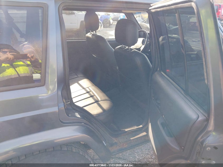 2001 Jeep Cherokee Limited/Sport VIN: 1J4FF58S91L584095 Lot: 43773643