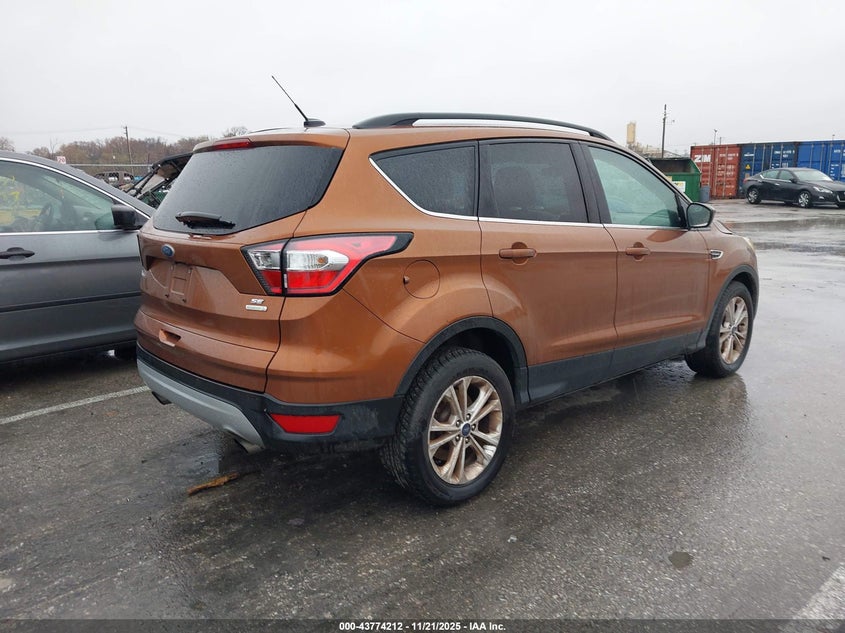 1FMCU0GD8HUC98856 2017 FORD ESCAPE photo no. 4