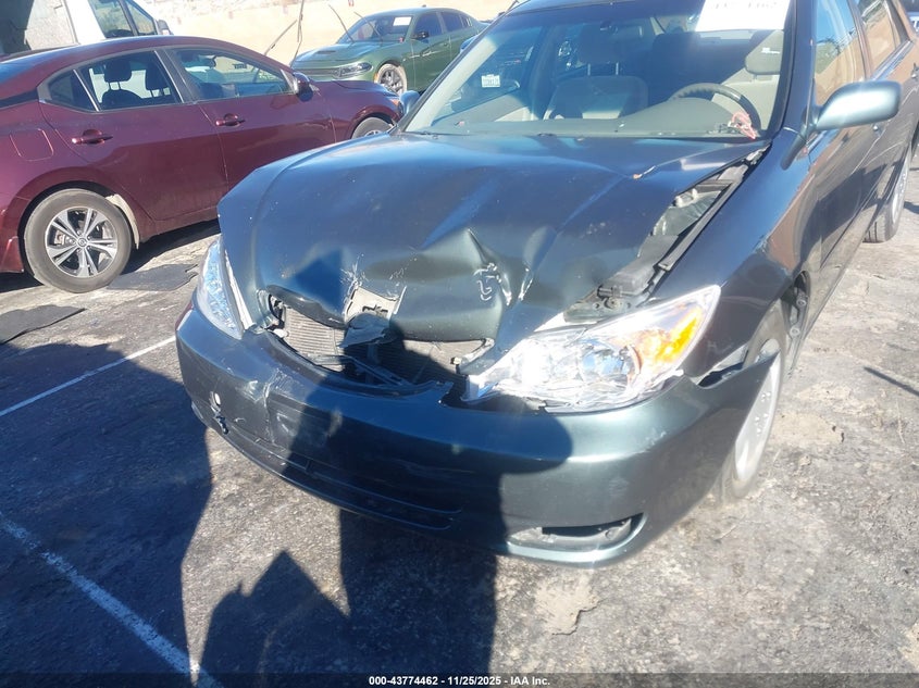 2004 Toyota Camry Le VIN: JTDBE32K340288631 Lot: 43774462