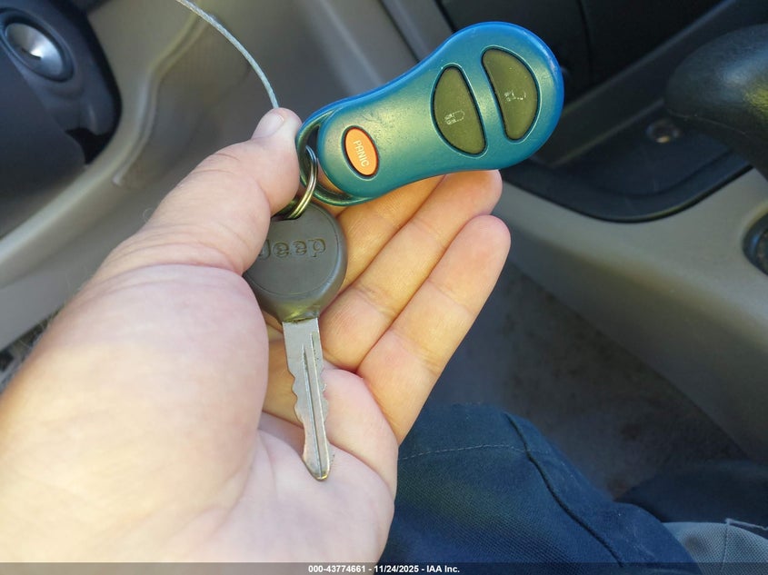 2000 Jeep Grand Cherokee Laredo VIN: 1J4GW48NXYC207200 Lot: 43774661