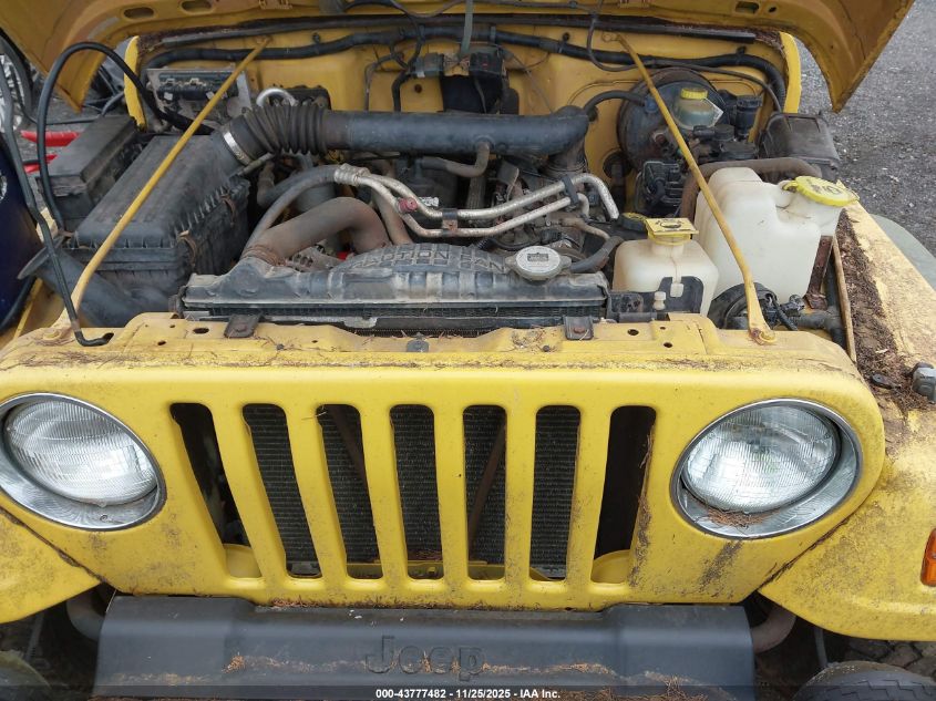 2000 Jeep Wrangler Sport VIN: 1J4FA49S0YP789850 Lot: 43777482