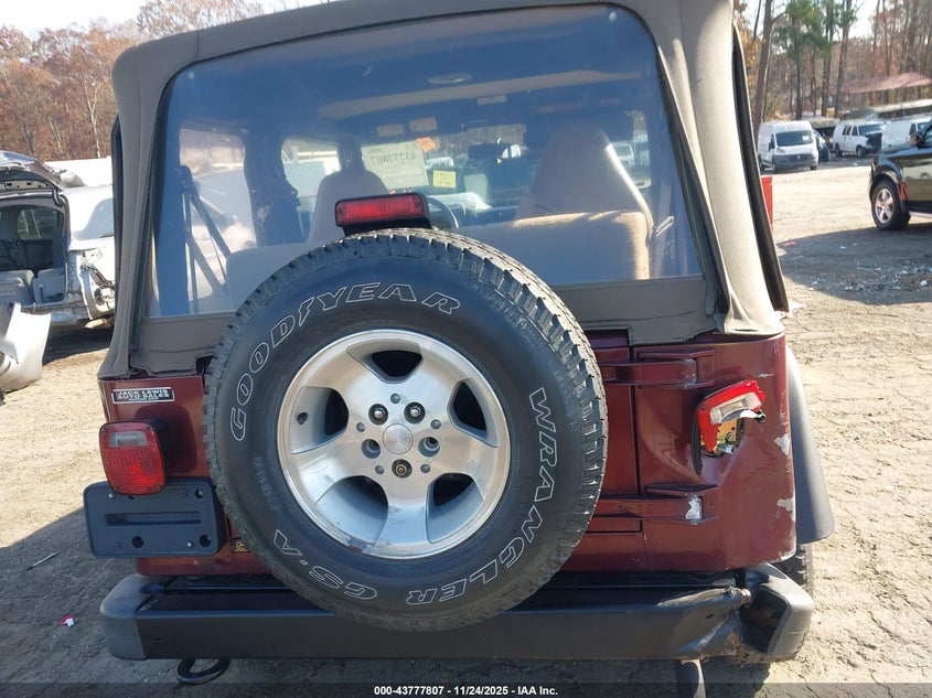 2002 Jeep Wrangler Sport VIN: 1J4FA49SX2P713303 Lot: 43777807