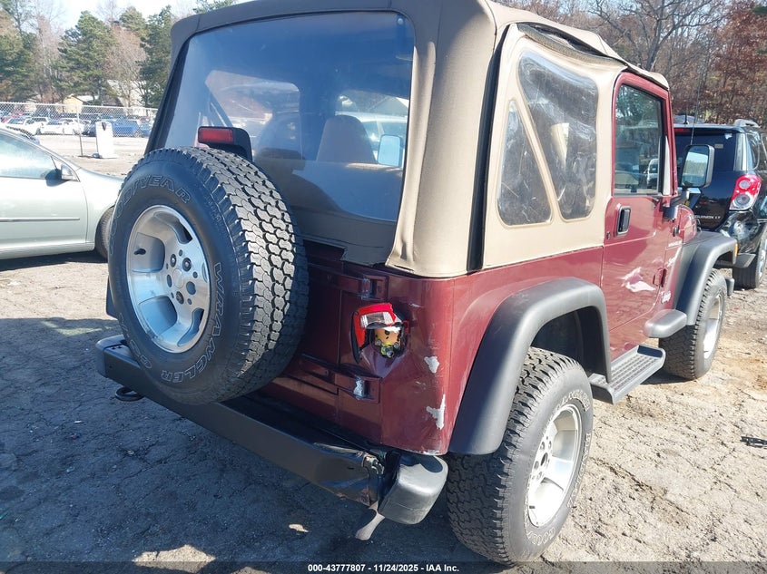 2002 Jeep Wrangler Sport VIN: 1J4FA49SX2P713303 Lot: 43777807