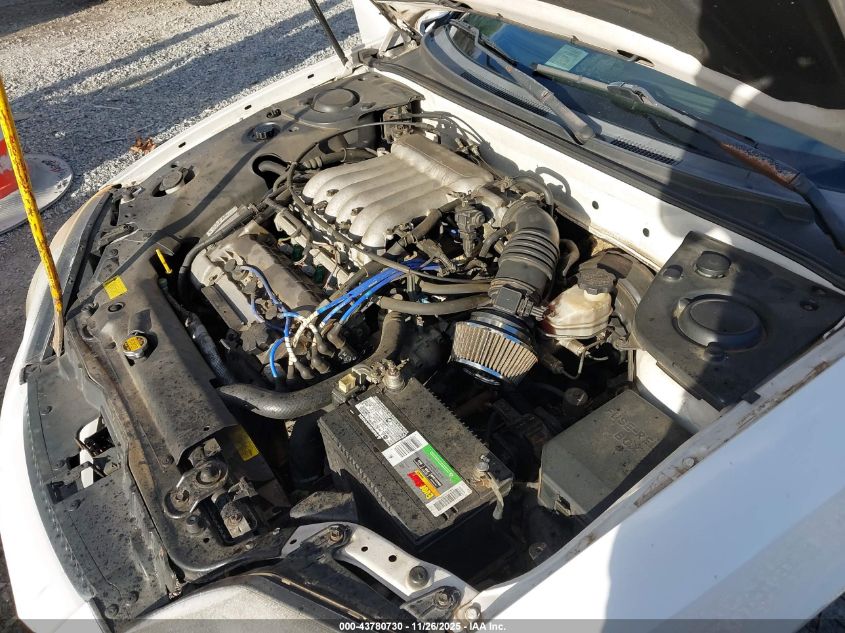 2003 Hyun Tiburon Gt 5-Speed Gt V6 VIN: KMHHN65F53U028955 Lot: 43780730