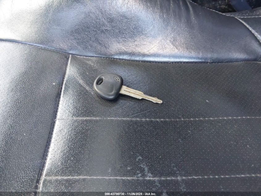 2003 Hyun Tiburon Gt 5-Speed Gt V6 VIN: KMHHN65F53U028955 Lot: 43780730