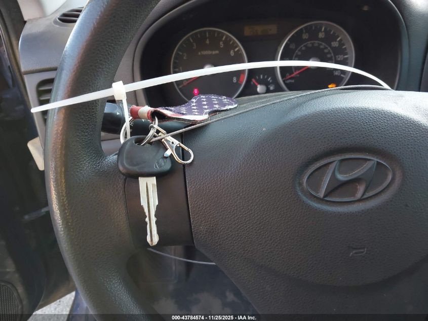 2008 Hyundai Accent Gs VIN: KMHCM36CX8U104404 Lot: 43784574