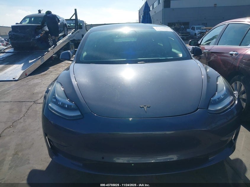 2020 Tesla Model 3 Standard Range Plus Rear-Wheel Drive/Standard Range Rear-Wheel Drive VIN: 5YJ3E1EA9LF661165 Lot: 43785825