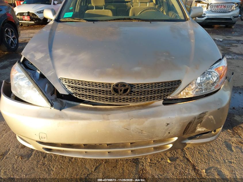 2004 Toyota Camry Le VIN: JTDBE32K340258934 Lot: 43786573